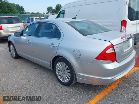 2011 Ford Fusion Hybrid z VIN 3FADP0L34BR208880, wystawiony jako IAAI lot #42432914 z przebiegiem 75 621 mil mil oraz . Historia ofert i sprzedaży dostępna na DreamBid. Obrazek 3.