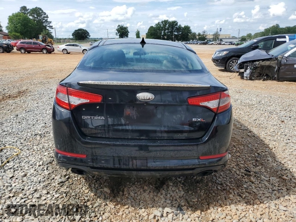 2013 Kia Optima SX с VIN 5XXGR4A62DG113547, выставлен на аукционе Copart как лот 58620955 с пробегом Не указан миль и Списание • Salvage title. История ставок и продаж доступна на DreamBid. Изображение 6.