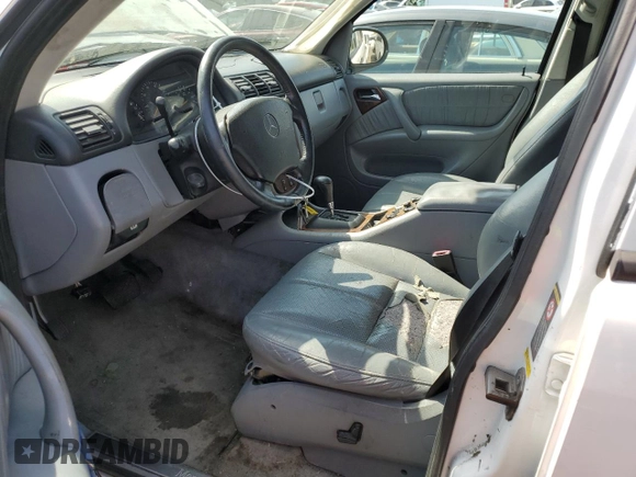2000 Mercedes-Benz M-Class with VIN 4JGAB54E5YA165660, listed as a Copart auction lot 65872364 with 115,668 mi miles and Salvage Title. Bid and sale history available at carsss.com. Image 7.