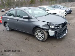 2019 Nissan Sentra S z VIN 3N1AB7AP6KY416455, wystawiony jako IAAI lot #42022373 z przebiegiem 107 269 mil mil oraz . Historia ofert i sprzedaży dostępna na DreamBid. Obrazek 1.