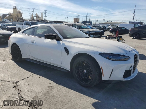 2023 BMW M4 Competition xDrive with VIN WBS43AZ02PCL59627, listed as a Copart auction lot 41871475 with Not provided miles and Salvage title. Bid and sale history available at DreamBid. Image 4.