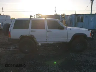 2000 Jeep Cherokee z VIN 1J4FF28P6YL132738, wystawiony jako IAAI lot #41382855 z przebiegiem 196 213 mil mil oraz . Historia ofert i sprzedaży dostępna na DreamBid. Obrazek 13.