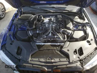 2020 BMW M5 Competition z VIN WBSJF0C00LCD34977, wystawiony jako Copart lot #68220242 z przebiegiem 9225 mil mil oraz . Historia ofert i sprzedaży dostępna na DreamBid. Obrazek 11.
