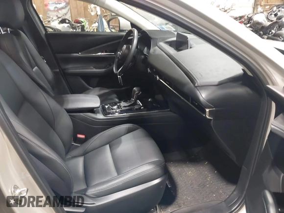 2024 Mazda CX-30 S Preferred with VIN 3MVDMBCM6RM609392, listed as a IAAI auction lot 42519708 with 40,757 mi miles and . Bid and sale history available at DreamBid. Image 5.
