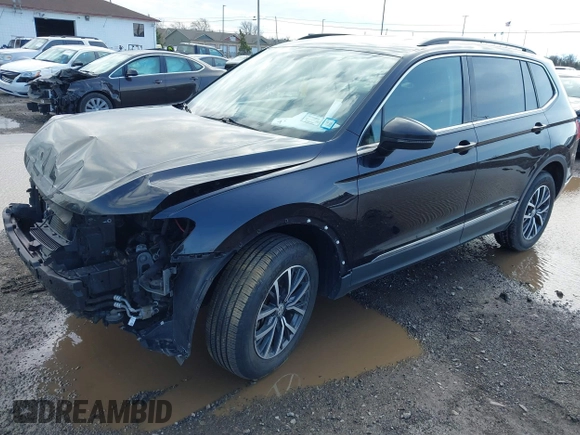 2020 Volkswagen Tiguan SE with VIN 3VV2B7AX5LM091857, listed as a IAAI auction lot 41922727 with 83,464 mi miles and . Bid and sale history available at DreamBid. Image 17.