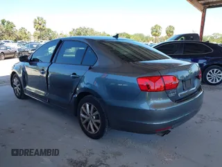 2012 Volkswagen Jetta Sedan SE w/Convenience with VIN 3VWDX7AJ6CM407834, listed as a IAAI auction lot 42013215 with 168,035 mi miles. Bid and sale history available at carsss.com. Image 3.