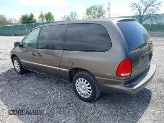 1999 Chrysler Town & Country LXi with VIN 1C4GP54LXXB553393, listed as a IAAI auction lot 41968605 with 256,400 mi miles. Bid and sale history available at carsss.com. Image 3.