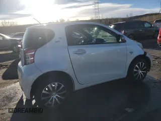 2014 Scion iQ with VIN JTNJJXB01EJ026837, listed as a Copart auction lot 43596385 with 52,826 mi miles and Salvage title. Bid and sale history available at DreamBid. Image 3.