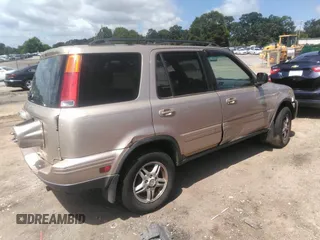 2001 Honda CR-V SE z VIN JHLRD18711C007481, wystawiony jako IAAI lot #42541213 z przebiegiem 275 020 mil mil oraz . Historia ofert i sprzedaży dostępna na DreamBid. Obrazek 4.