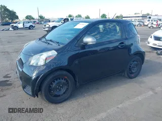 2013 Scion iQ with VIN JTNJJXB04DJ024322, listed as a IAAI auction lot 42618525 with 154,559 mi miles and . Bid and sale history available at DreamBid. Image 2.