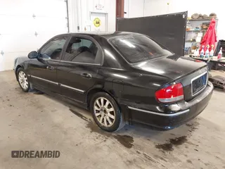 2003 Hyundai Sonata GLS with VIN KMHWF35H33A782779, listed as a IAAI auction lot 41702937 with 285,264 mi miles. Bid and sale history available at carsss.com. Image 3.