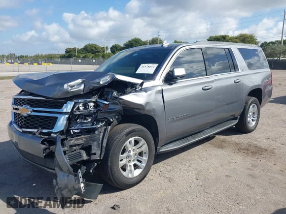 2020 Chevrolet Suburban LT z VIN 1GNSCHKC8LR157188, wystawiony jako IAAI lot #41578614 z przebiegiem 82 566 mil mil oraz . Historia ofert i sprzedaży dostępna na DreamBid. Obrazek 17.