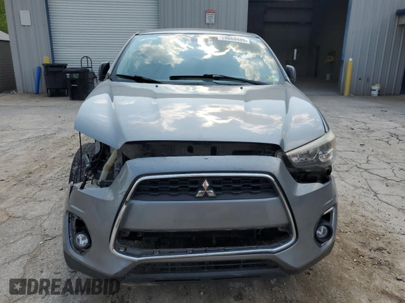 2014 Mitsubishi Outlander SE z VIN 4A4AR4AU2EE023060, wystawiony jako Copart lot #59660495 z przebiegiem 169 570 mil mil oraz Szkoda całkowita • Salvage title. Historia ofert i sprzedaży dostępna na DreamBid. Obrazek 5.