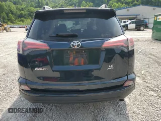 2018 Toyota RAV4 LE with VIN JTMBFREV7JJ253067, listed as a Copart auction lot 60596735 with Not provided miles and Salvage title. Bid and sale history available at DreamBid. Image 6.