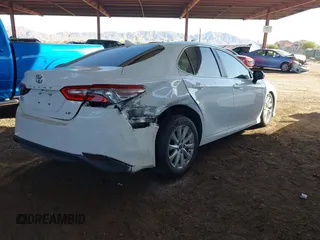 2020 Toyota Camry LE with VIN 4T1C11AK7LU401666, listed as a IAAI auction lot 41865235 with 69,189 mi miles. Bid and sale history available at carsss.com. Image 4.