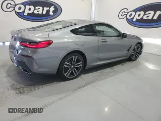 2025 BMW 8 Series 840i with VIN WBAAE4C01SCS11313, listed as a Copart auction lot 73431104 with 4,605 mi miles and Clean Title. Bid and sale history available at carsss.com. Image 3.