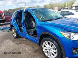 2013 Mazda CX-5 Grand Touring with VIN JM3KE4DE4D0123837, listed as a IAAI auction lot 42031074 with 121,818 mi miles. Bid and sale history available at carsss.com. Image 6.