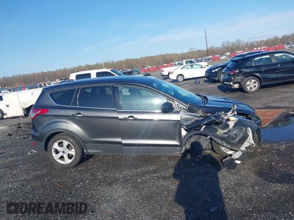 2016 Ford Escape SE with VIN 1FMCU9GX1GUB67636, listed as a IAAI auction lot 41929725 with 68,297 mi miles. Bid and sale history available at carsss.com. Image 13.