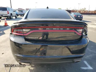 2019 Dodge Charger SXT with VIN 2C3CDXJG8KH757818, listed as a Copart auction lot 49518475 with 98,129 mi miles and Salvage Title. Bid and sale history available at DreamBid. Image 6.