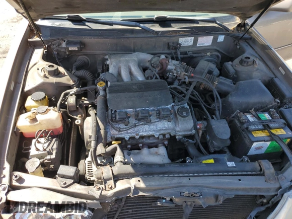 1998 Toyota Avalon XL with VIN 4T1BF18BXWU228989, listed as a Copart auction lot 53821495 with 157,209 mi miles and Salvage Title. Bid and sale history available at DreamBid. Image 11.