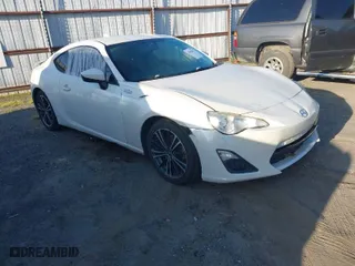 2015 Scion FR-S with VIN JF1ZNAA18F8710690, listed as a IAAI auction lot 41982647 with 220,696 mi miles. Bid and sale history available at carsss.com. Image 1.