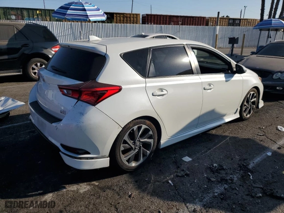 2018 Toyota Corolla iM with VIN JTNKARJE3JJ558579, listed as a Copart auction lot 74321954 with 182,506 mi miles and Salvage Title. Bid and sale history available at carsss.com. Image 3.