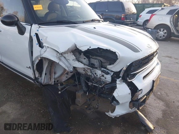 2015 MINI Cooper Countryman S with VIN WMWZC5C50FWP42324, listed as a IAAI auction lot 41795698 with 95,746 mi miles. Bid and sale history available at carsss.com. Image 6.