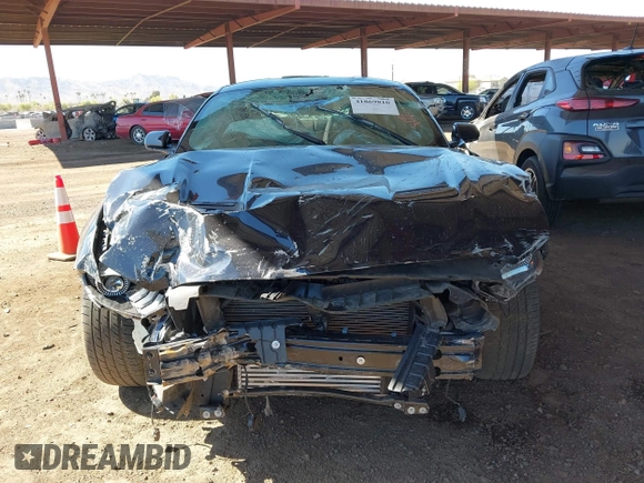 2021 Ford Mustang EcoBoost with VIN 1FA6P8TH2M5104154, listed as a IAAI auction lot 41869810 with 15,561 mi miles and . Bid and sale history available at DreamBid. Image 11.