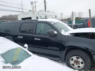 2010 Chevrolet Suburban LS with VIN 1GNUKHE37AR203811, listed as a IAAI auction lot 41304431 with 999,999 mi miles. Bid and sale history available at carsss.com. Image 12.