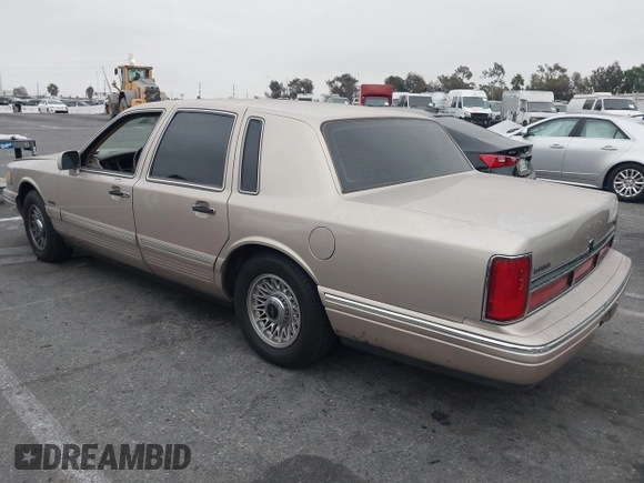 1997 Lincoln Town Car Executive with VIN 1LNLM81W6VY754706, listed as a IAAI auction lot 41375121 with 185,863 mi miles and . Bid and sale history available at DreamBid. Image 3.