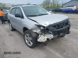 2008 Lexus RX 400h with VIN JTJHW31U482853485, listed as a IAAI auction lot 42145051 with 199,230 mi miles and . Bid and sale history available at DreamBid. Image 1.