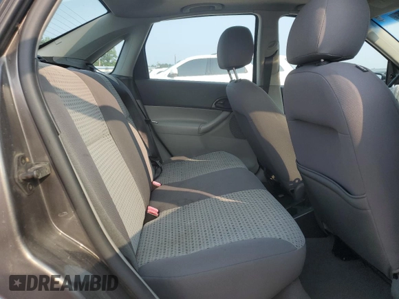 2006 Ford Focus S с VIN 1FAHP34N06W115926, выставлен на аукционе Copart как лот 59145555 с пробегом 263 717 миль миль и Списание • Salvage title. История ставок и продаж доступна на DreamBid. Изображение 10.