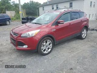 2016 Ford Escape Titanium with VIN 1FMCU9J90GUA02736, listed as a Copart auction lot 63068165 with 23,860 mi miles and Salvage title. Bid and sale history available at DreamBid. Image 1.