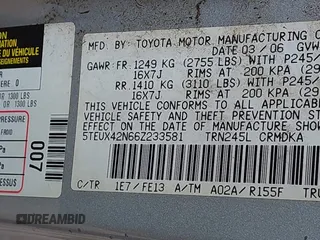 2006 Toyota Tacoma with VIN 5TEUX42N66Z233581, listed as a IAAI auction lot 41897141 with 153,117 mi miles and . Bid and sale history available at DreamBid. Image 9.