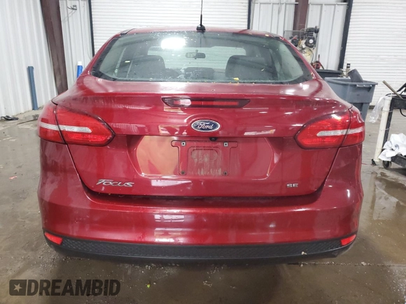 2017 Ford Focus SE with VIN 1FADP3F26HL209475, listed as a Copart auction lot 58416185 with 71,318 mi miles and Salvage title. Bid and sale history available at DreamBid. Image 6.
