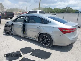 2018 Toyota Avalon XLE with VIN 4T1BK1EB7JU281738, listed as a IAAI auction lot 42148342 with 118,049 mi miles and . Bid and sale history available at DreamBid. Image 3.