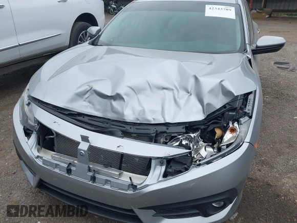 2017 Honda Civic EX-L с VIN 19XFC1F72HE017784, выставлен на аукционе IAAI как лот 42343789 с пробегом 146 487 миль миль и . История ставок и продаж доступна на DreamBid. Изображение 6.
