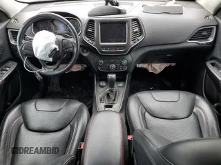 2019 Jeep Cherokee Trailhawk Elite with VIN 1C4PJMBX7KD140720, listed as a Copart auction lot 64268064 with 61,747 mi miles and Salvage Title. Bid and sale history available at carsss.com. Image 8.