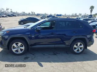 2021 Toyota RAV4 Hybrid LE with VIN 4T3B6RFV4MU025144, listed as a IAAI auction lot 42398033 with 65,994 mi miles and . Bid and sale history available at DreamBid. Image 14.