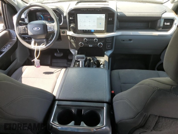 2023 Ford F-150 Lightning Pro with VIN 1FT6W1EVXPWG44972, listed as a Copart auction lot 60303485 with 19,788 mi miles and Salvage title. Bid and sale history available at DreamBid. Image 8.