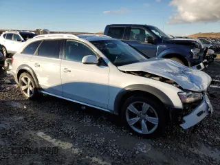 2016 Audi allroad Premium Plus with VIN WA1UFAFL9GA015036, listed as a Copart auction lot 82052924 with 98,625 mi miles and Salvage Title. Bid and sale history available at carsss.com. Image 4.