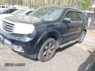 2012 Honda Pilot Touring with VIN 5FNYF4H92CB051260, listed as a IAAI auction lot 41906802 with 256,691 mi miles. Bid and sale history available at carsss.com. Image 17.