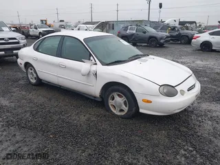 1999 Ford Taurus SE with VIN 1FAFP53U5XA269767, listed as a IAAI auction lot 41504302 with 182,198 mi miles. Bid and sale history available at carsss.com. Image 1.
