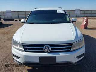 2018 Volkswagen Tiguan S with VIN 3VV0B7AX8JM076693, listed as a IAAI auction lot 42044886 with 109,660 mi miles and . Bid and sale history available at DreamBid. Image 6.
