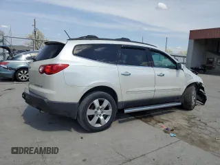 2012 Chevrolet Traverse LTZ z VIN 1GNKRLED5CJ197457, wystawiony jako Copart lot #54143415 z przebiegiem 225 609 mil mil oraz Szkoda całkowita • Salvage title. Historia ofert i sprzedaży dostępna na DreamBid. Obrazek 3.