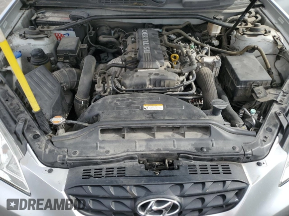 2011 Hyundai Genesis Coupe z VIN KMHHT6KD8BU045109, wystawiony jako Copart lot #53563715 z przebiegiem 66 701 mil mil oraz Szkoda całkowita • Salvage title. Historia ofert i sprzedaży dostępna na DreamBid. Obrazek 11.