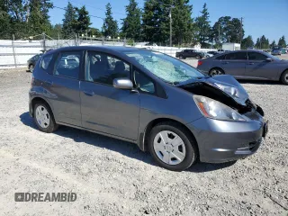 2013 Honda Fit с VIN JHMGE8H34DC069516, выставлен на аукционе Copart как лот 59993335 с пробегом 128 798 миль миль и Списание • Salvage title. История ставок и продаж доступна на DreamBid. Изображение 4.