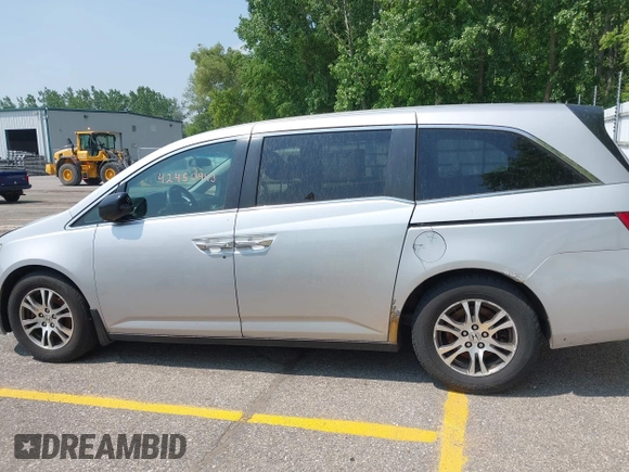 2011 Honda Odyssey EX с VIN 5FNRL5H44BB004530, выставлен на аукционе IAAI как лот 42450443 с пробегом 238 945 миль миль и . История ставок и продаж доступна на DreamBid. Изображение 14.
