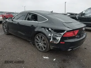 2012 Audi A7 Premium Plus with VIN WAUYGAFC0CN096027, listed as a IAAI auction lot 40881391 with 155,433 mi miles and . Bid and sale history available at DreamBid. Image 3.