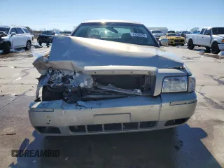 2009 Mercury Grand Marquis LS with VIN 2MEHM75V09X619313, listed as a Copart auction lot 41596455 with 198,017 mi miles and Salvage Title. Bid and sale history available at DreamBid. Image 5.